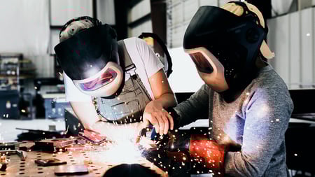 students learning how to weld. 