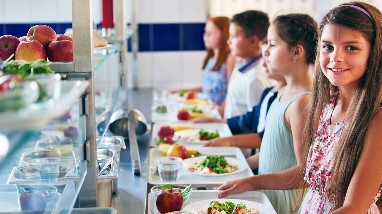 Children in line at a cafeteria 