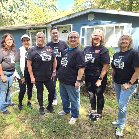 Peak employees posing. 